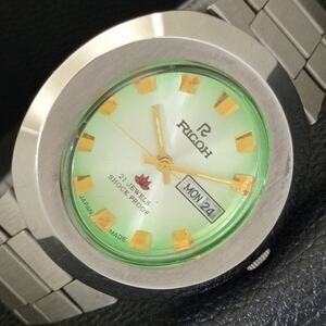 Vintage 1977 Ricoh Automatic Mens Silver Watch W/daydate & Green accents